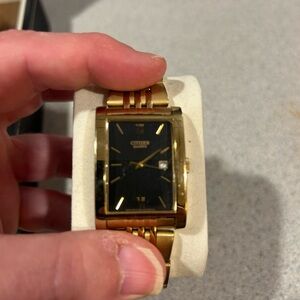Citizen Men's Gold and Black Rectangular Watch